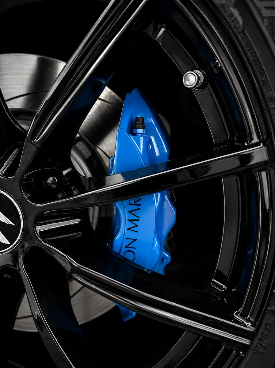 Blue painted brake caliper on gloss black wheel — Hussle Customz Los Angeles