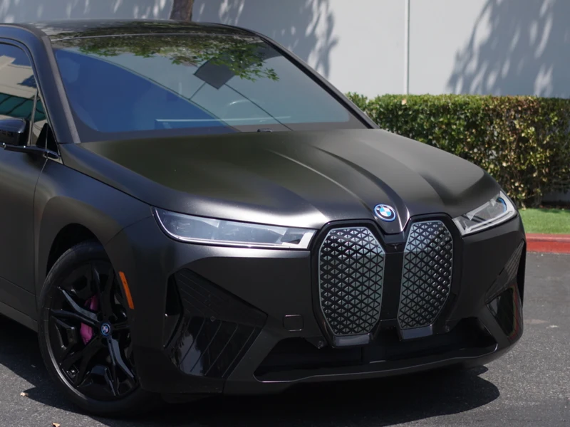 BMW iX Diamond Black Vinyl Wrap — photo 4 — Hussle Customz Los Angeles
