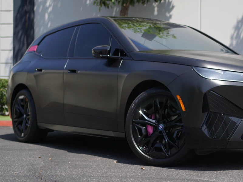 BMW iX Diamond Black Vinyl Wrap — photo 5 — Hussle Customz Los Angeles