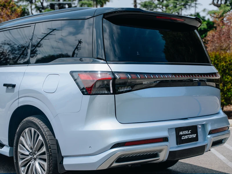 Infiniti QX80 Metallic Blue — photo 2 — Hussle Customz Los Angeles