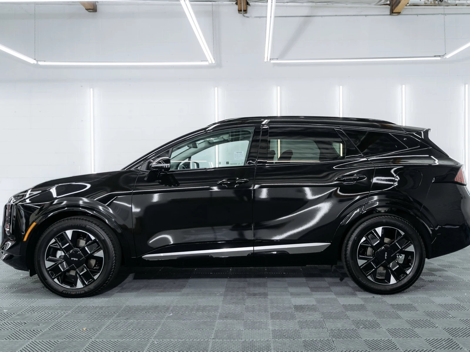 Kia Sportage Gloss Black Vinyl Wrap — photo 2 — Hussle Customz Los Angeles