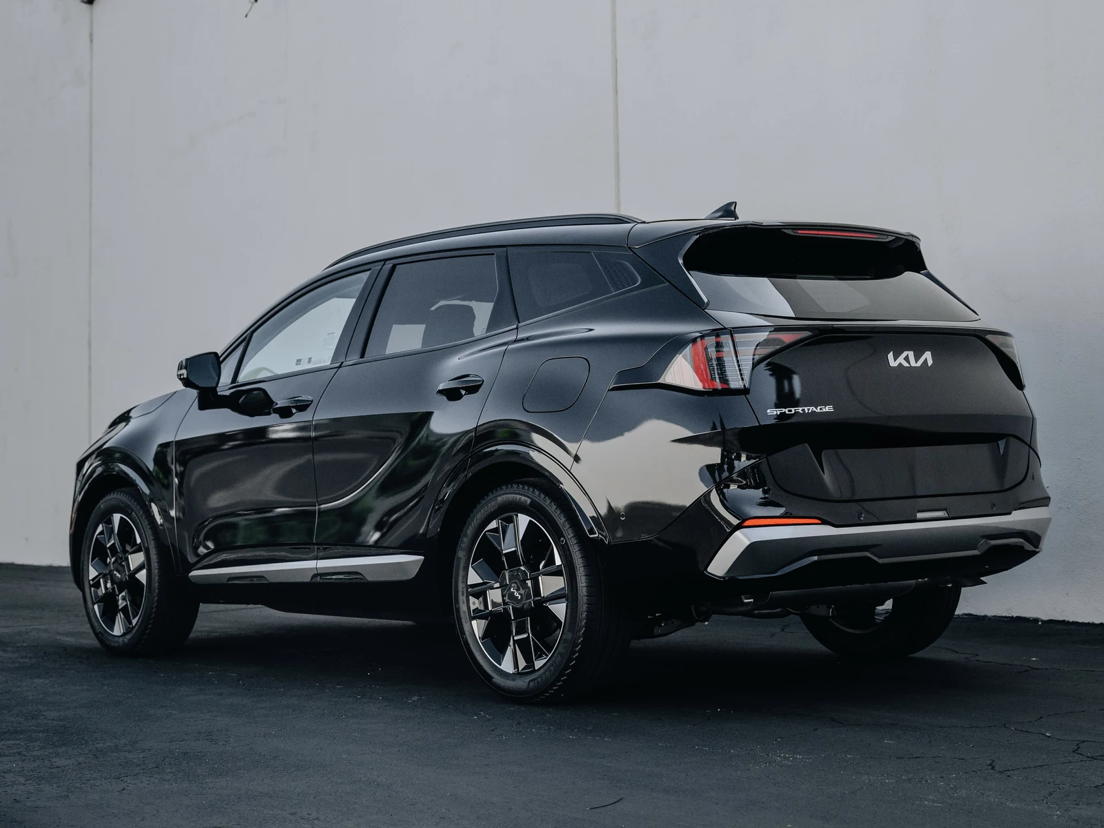 Kia Sportage Gloss Black Vinyl Wrap — photo 3 — Hussle Customz Los Angeles