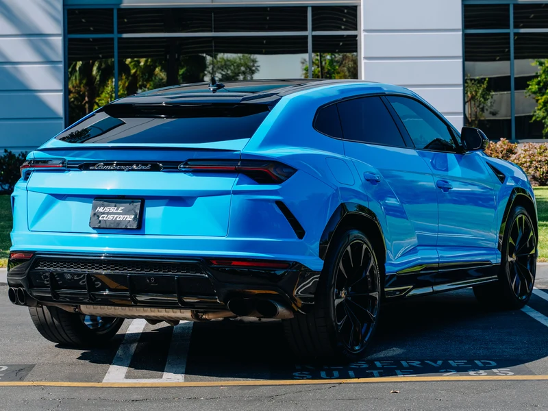 Lamborghini Urus Gloss Baby Blue Vinyl Wrap — photo 3 — Hussle Customz Los Angeles