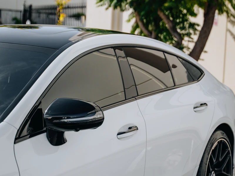 Mercedes-AMG GT53 with all four ceramic-tinted side windows at Hussle Customz Los Angeles