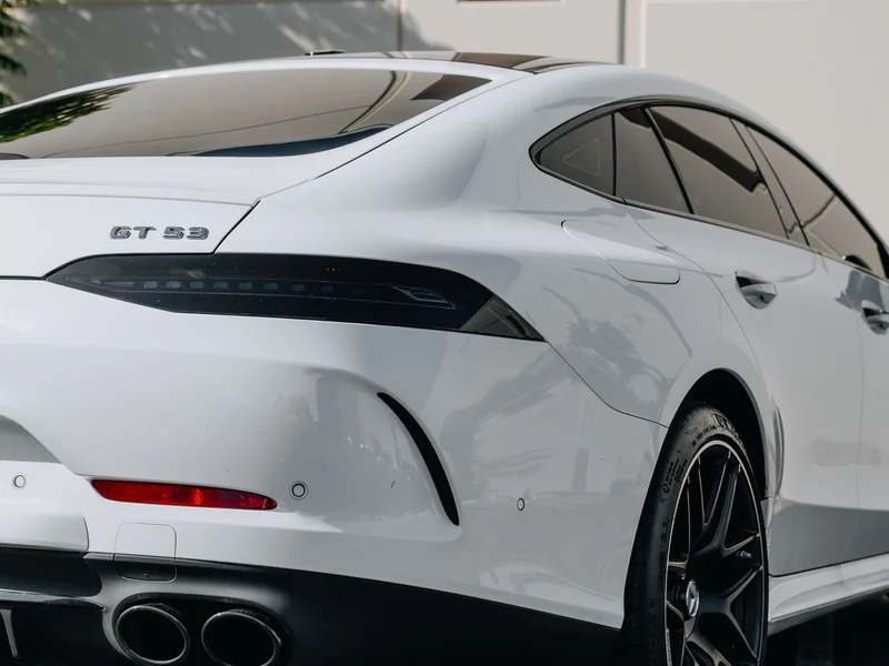 Mercedes GT53 rear three-quarter view showing dark tinted rear glass and quarter window