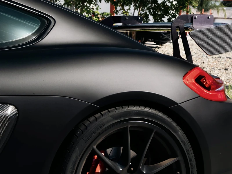 Porsche Cayman Matte Black and Satin Red Stripes — photo 3 — Hussle Customz Los Angeles