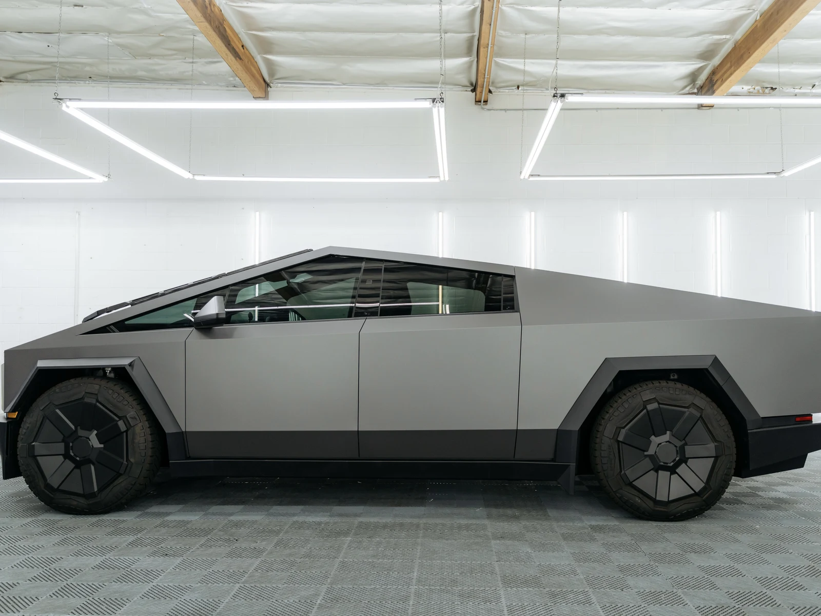 Tesla Cybertruck Matte Charcoal Metallic Vinyl Wrap — photo 2 — Hussle Customz Los Angeles