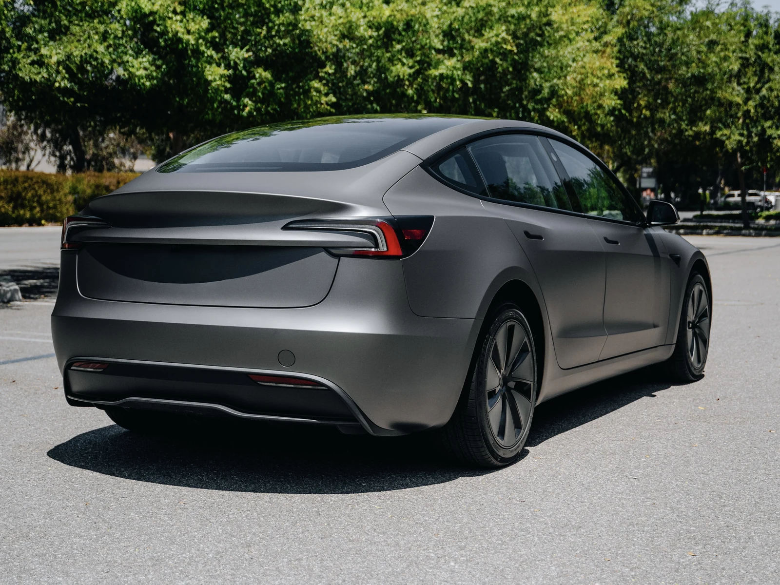 Tesla Model 3 Highland Matte Charcoal Metallic Vinyl Wrap — photo 3 — Hussle Customz Los Angeles
