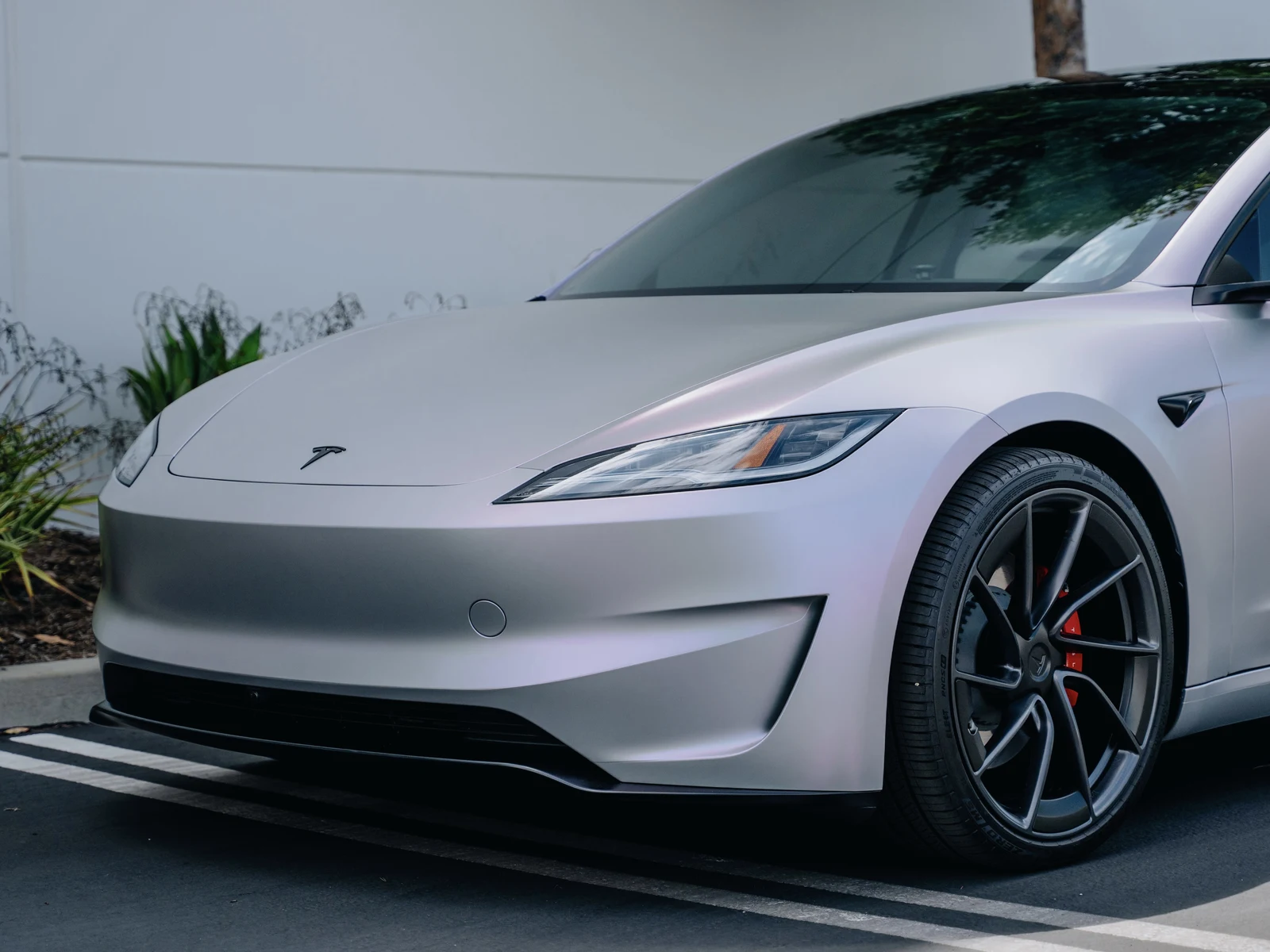 Tesla Model 3 Highland Platinum Pink Vinyl Wrap — photo 3 — Hussle Customz Los Angeles