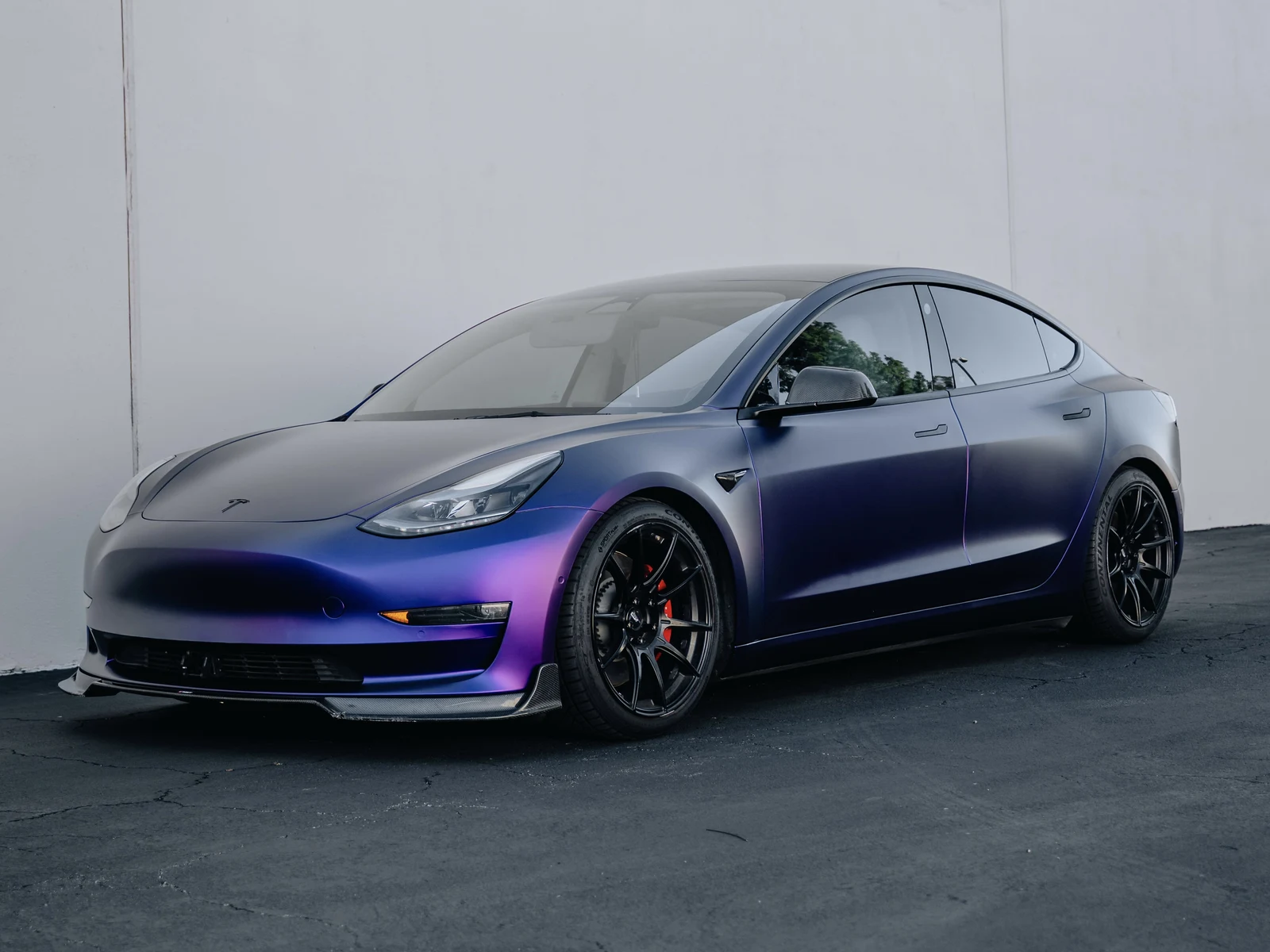 Tesla Model 3 &mdash; Matte Purple Black Iridescent Wrap | Hussle Customz