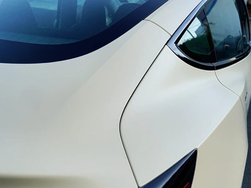 Tesla Model 3 Tan Vinyl Wrap, Chrome Delete — photo 2 — Hussle Customz Los Angeles