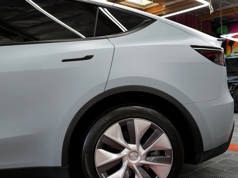 Tesla Model Y with STEK ceramic tint and color PPF