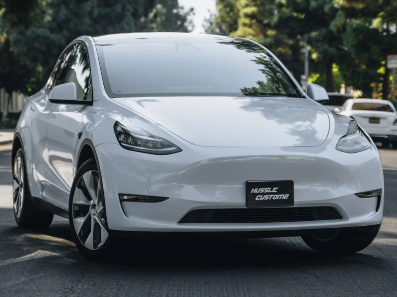 Tesla Model Y — Gloss Cloudy Blue Vinyl Wrap | Hussle Customz