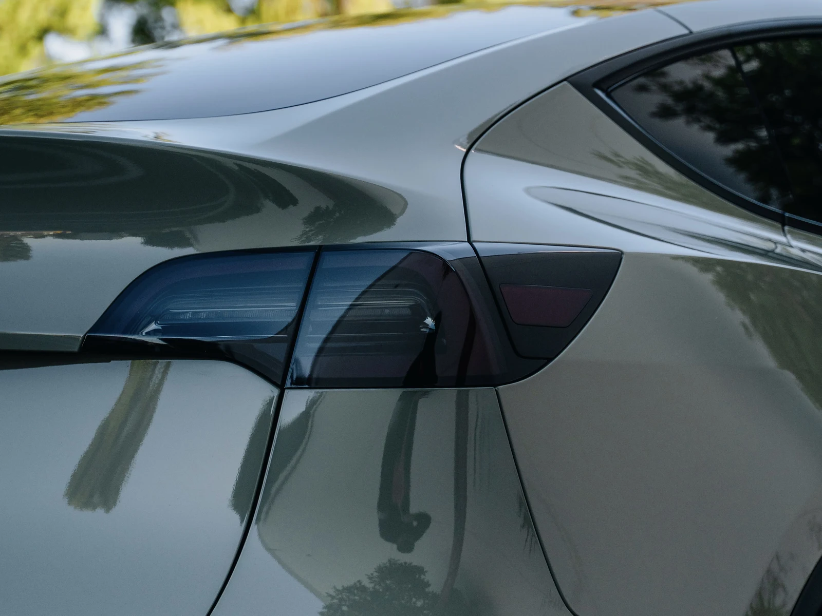 Tesla Model Y Gloss Moss Green Wrap, Smoked Lights — photo 5 — Hussle Customz Los Angeles