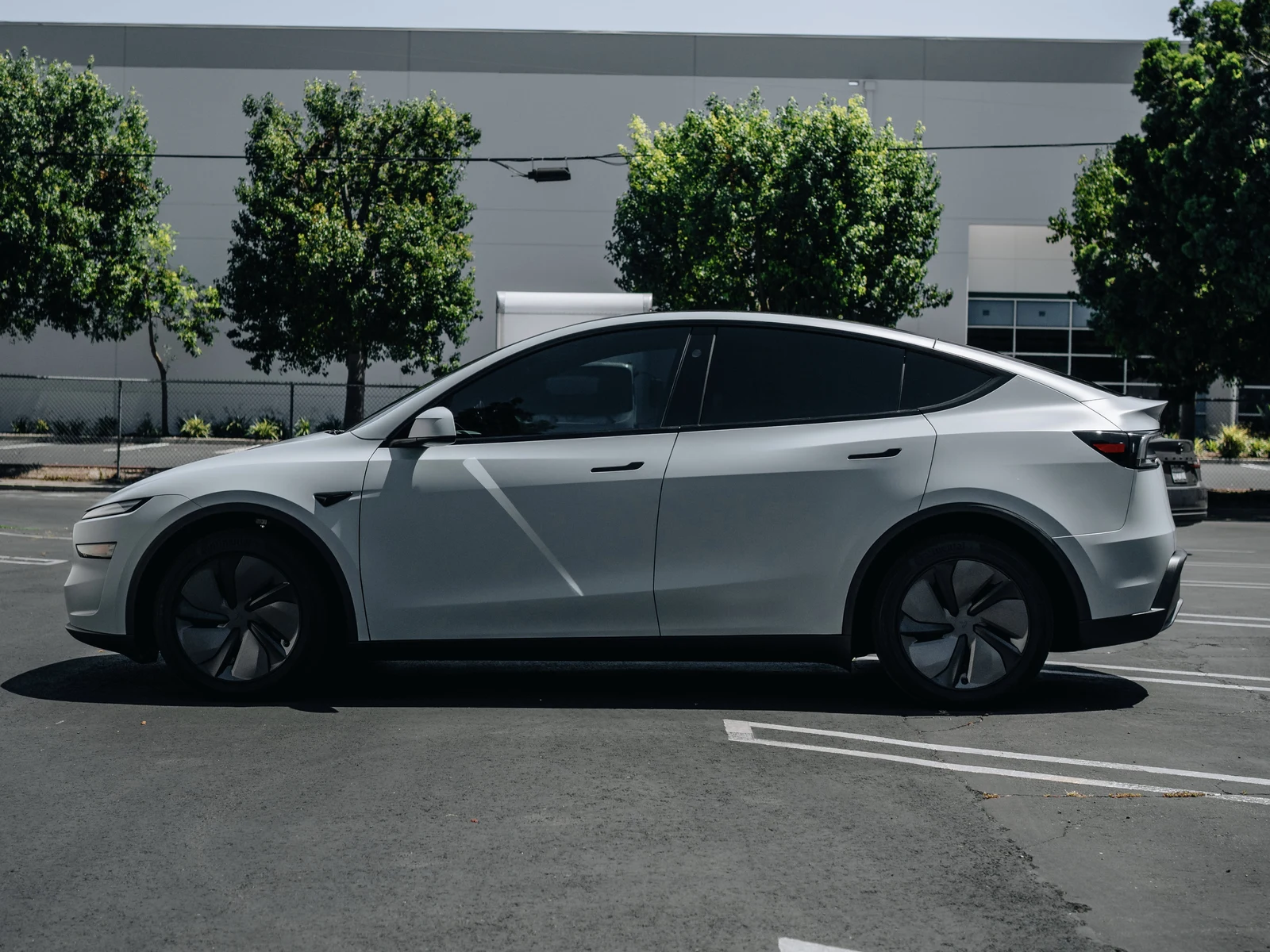 Tesla Model Y Juniper Satin Battleship Grey Vinyl Wrap — photo 3 — Hussle Customz Los Angeles