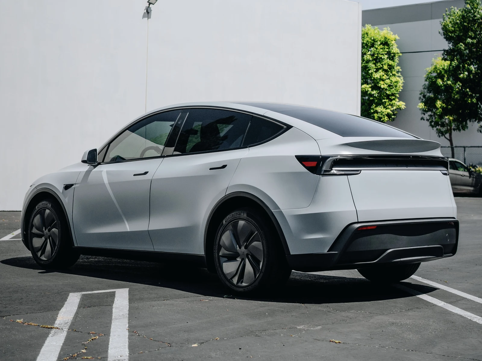 Tesla Model Y Juniper Satin Battleship Grey Vinyl Wrap — photo 4 — Hussle Customz Los Angeles