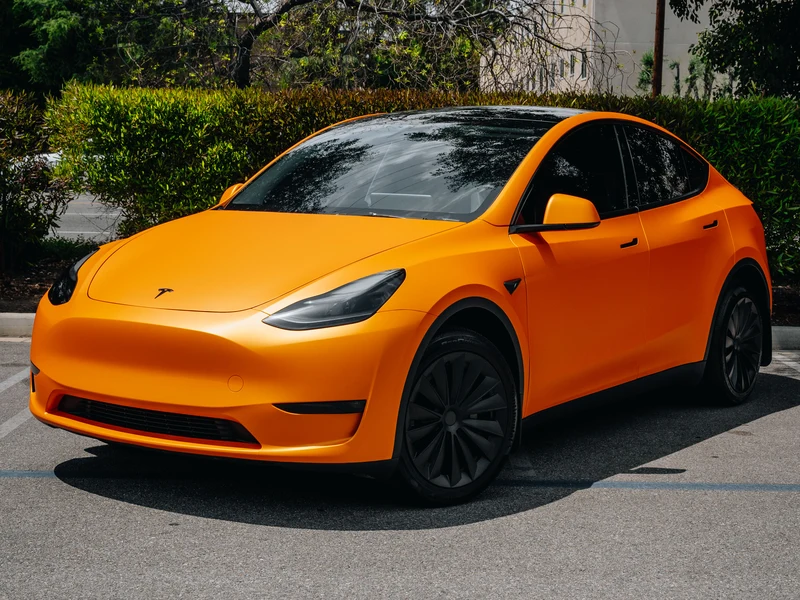 Tesla Model Y — Matte Orange | Hussle Customz