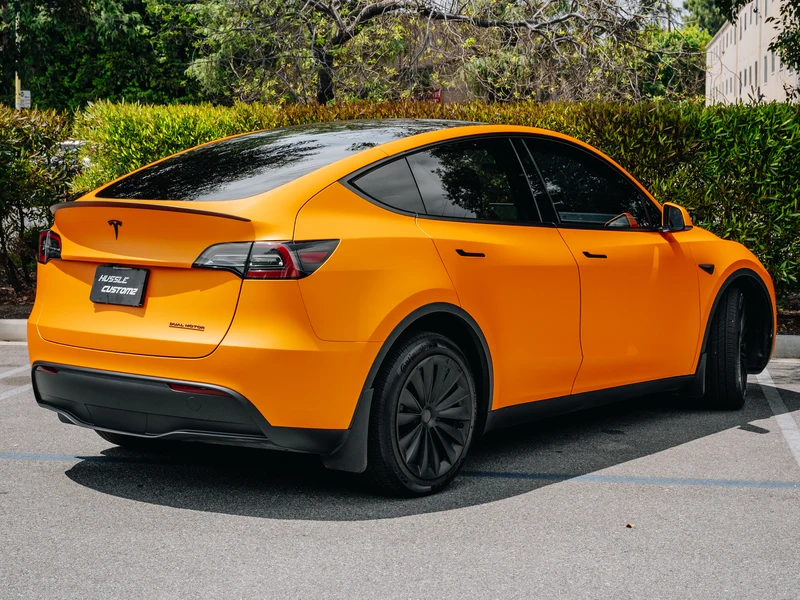 Tesla Model Y Matte Orange — photo 3 — Hussle Customz Los Angeles