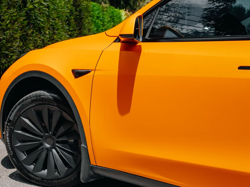 Tesla Model Y Matte Orange — photo 4 — Hussle Customz Los Angeles